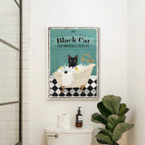 a bathroom with a toilet and a poster on the wall
