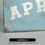 The image is an aluminum print that is waterproof and perfect for outdoor use, as well as hanging hardware.