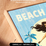 a framed artwork with a beach scene, including palm trees and a woman with long hair. The artwork is described as having "Artwork wraps around the sides of canvas" and "All canvas prints include hanging hardware" and "High quality archival inks".