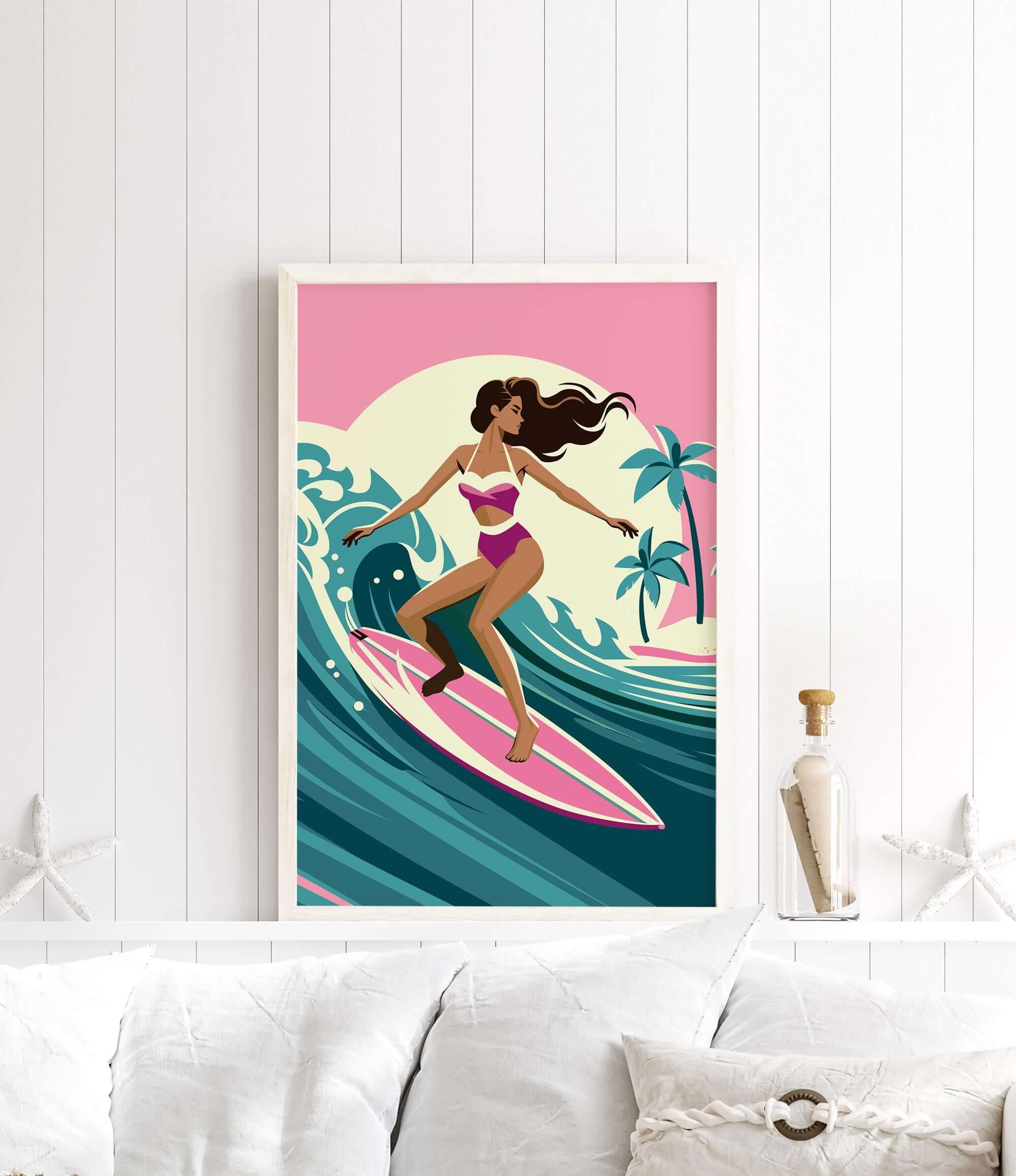 A framed illustration of a woman surfing on a pink surfboard against a tropical background.