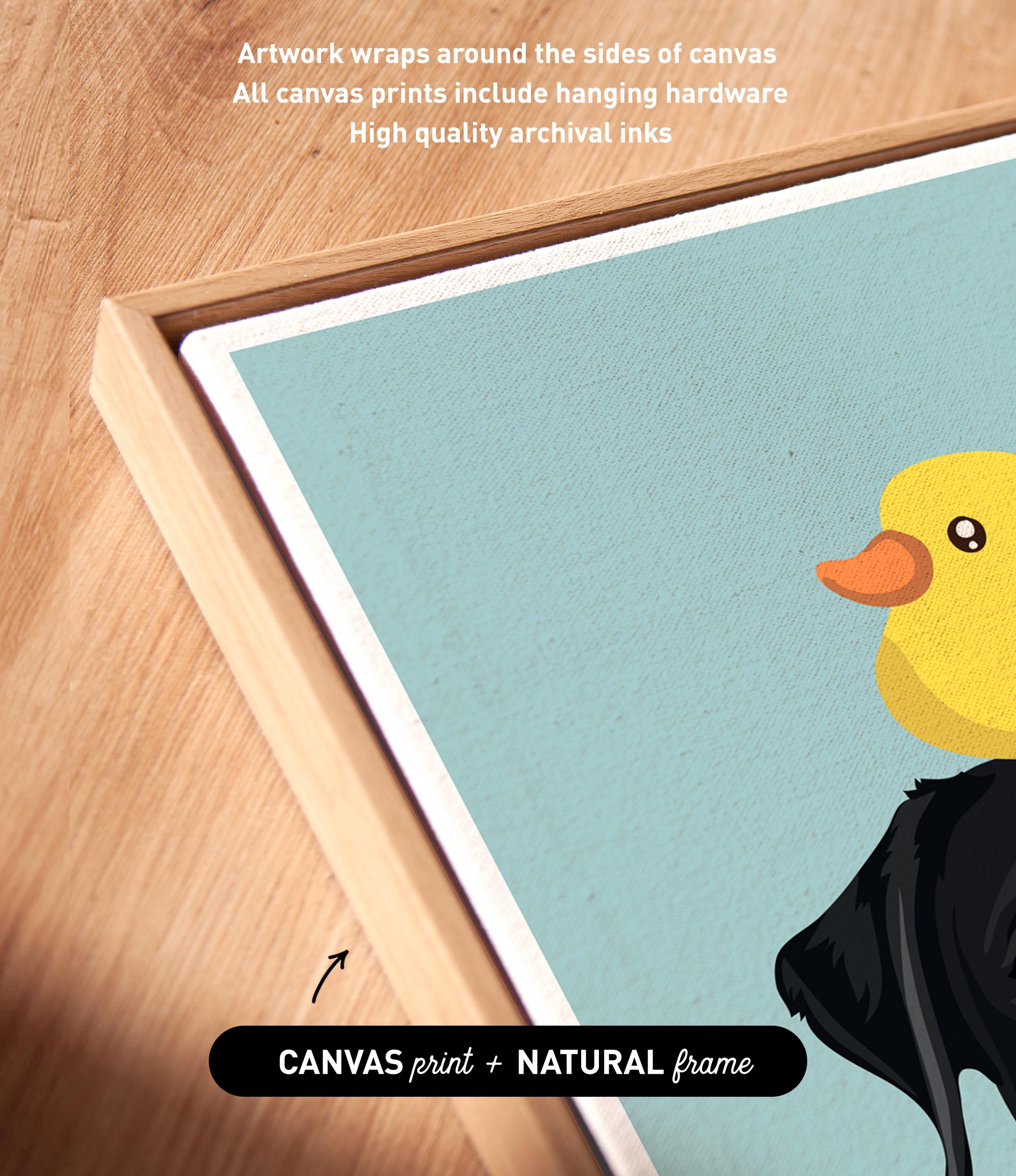 a vibrant artwork of a yellow duck with a black beak, set against a light blue background. The artwork is framed in a natural frame, and the text indicates that the artwork wraps around the sides of the canvas, and all canvas prints include hanging hardware for high quality archival inks.