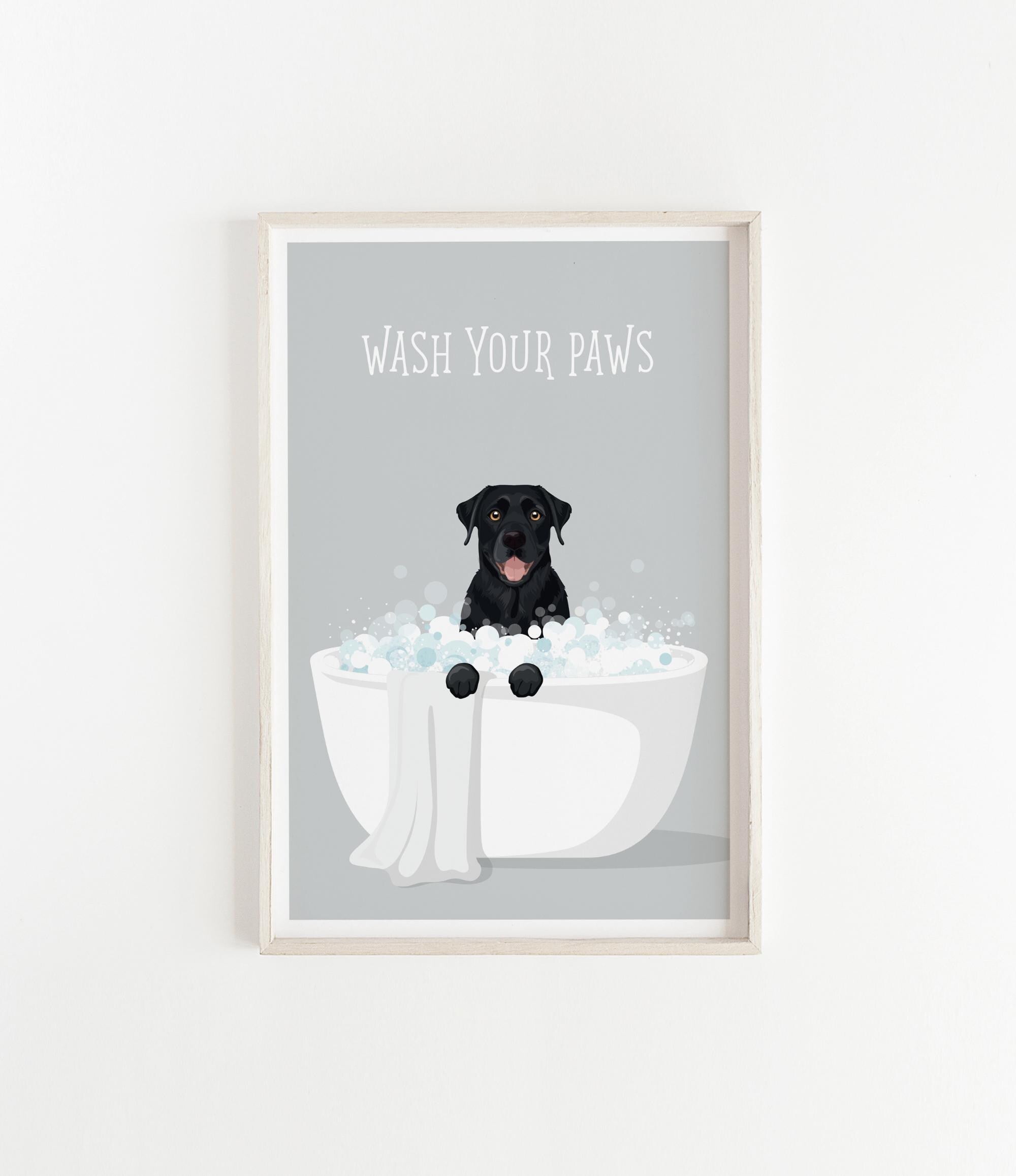 A framed illustration of a black dog sitting in a white bathtub filled with bubbles, with the text "WASH YOUR PAWS" displayed above it.