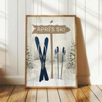 A framed print featuring a winter scene with a sign that says "APRÈS SKI" and a pair of skis