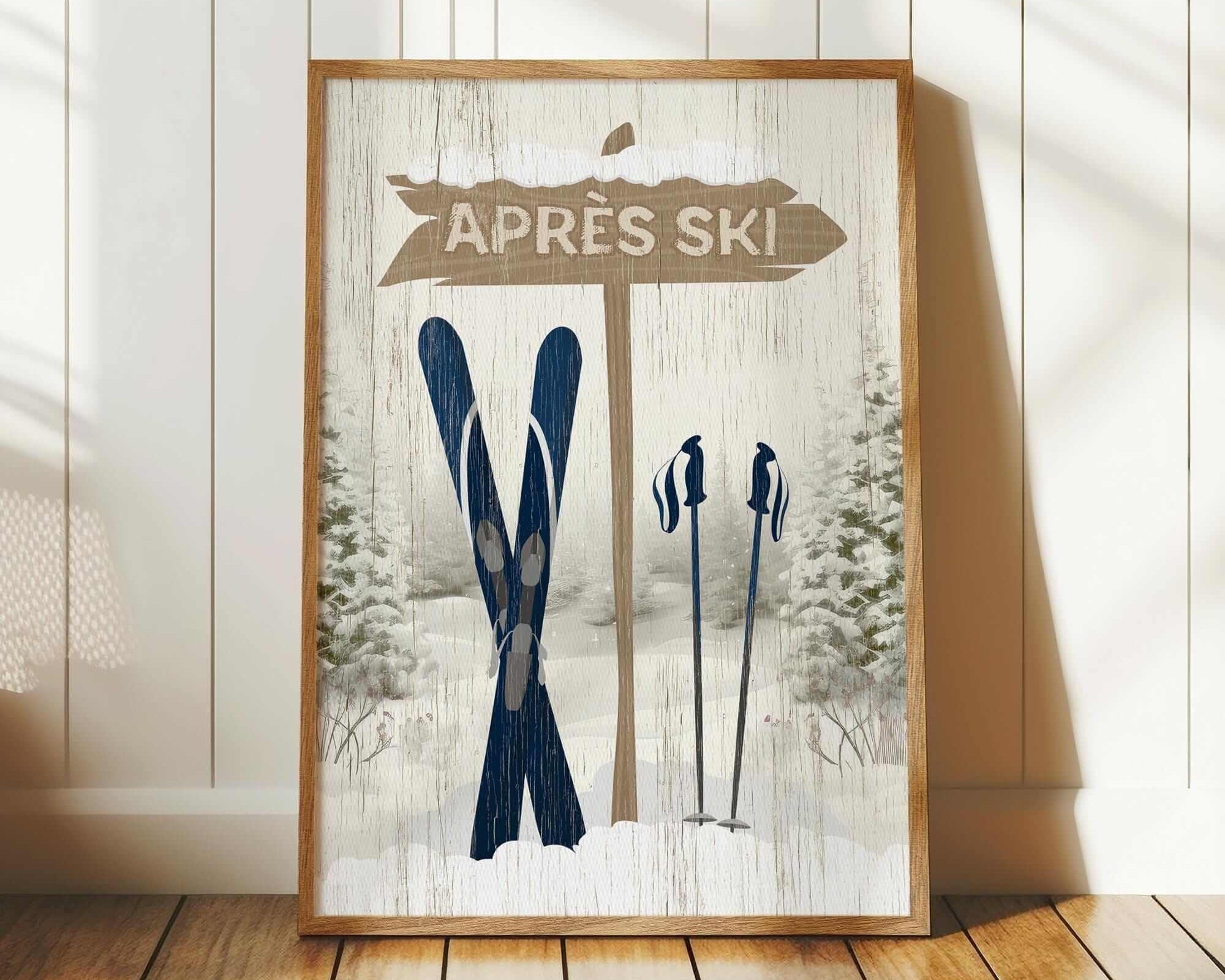 A framed print featuring a winter scene with a sign that says "APRÈS SKI" and a pair of skis