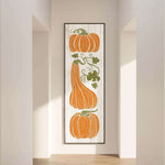 a painting of pumpkins hanging on a wall
