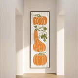a painting of pumpkins hanging on a wall