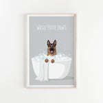 A framed illustration of a German Shepherd dog sitting in a white bathtub filled with bubbles, with the text "WASH YOUR PAWS" displayed above it.