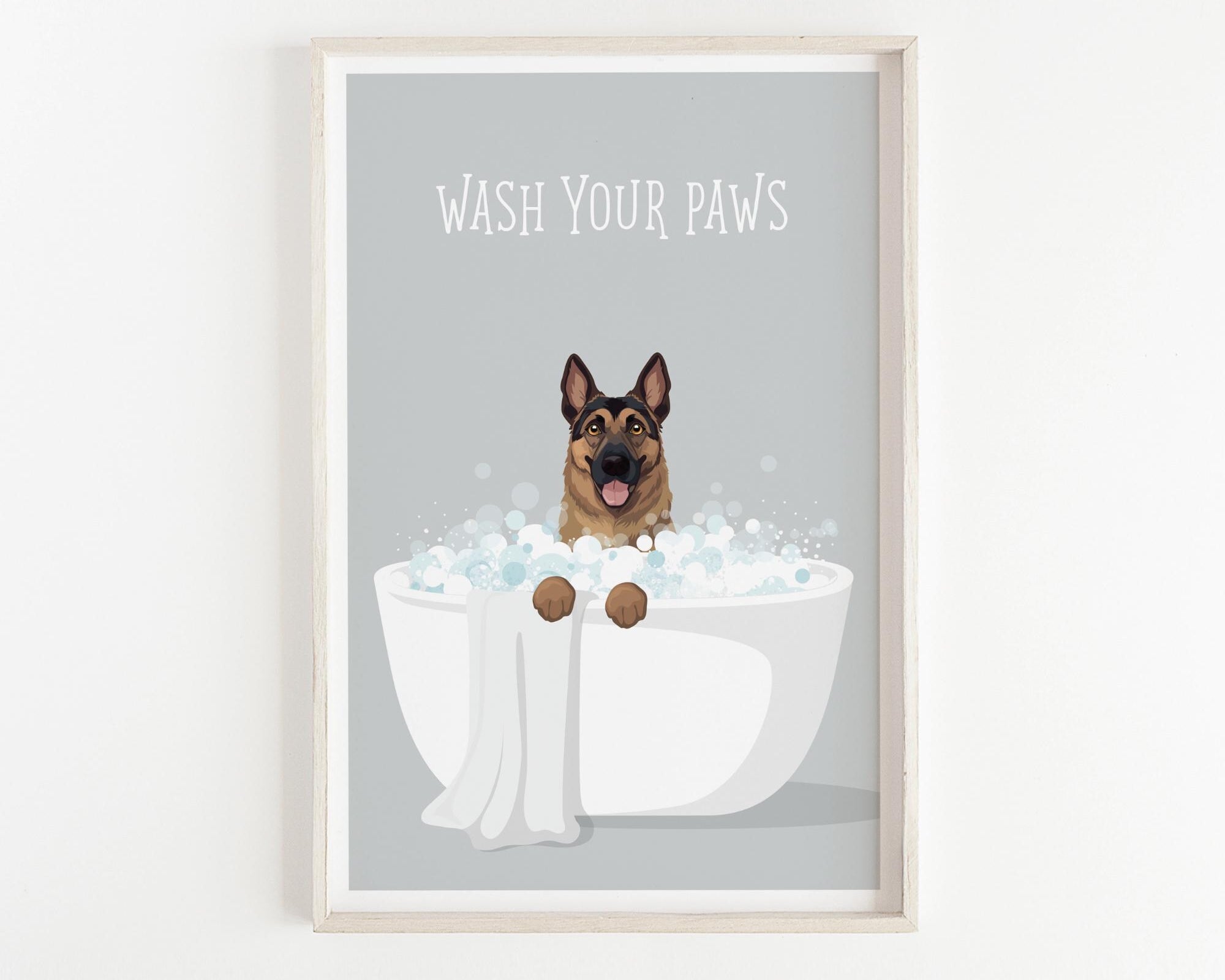 A framed illustration of a German Shepherd dog sitting in a white bathtub filled with bubbles, with the text "WASH YOUR PAWS" displayed above it.