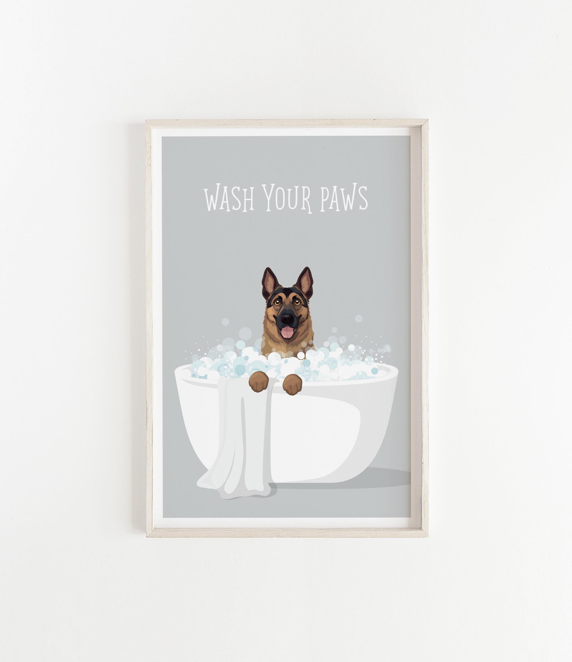 A framed illustration of a German Shepherd dog sitting in a white bathtub filled with bubbles, with the text "WASH YOUR PAWS" displayed above it.