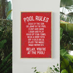 a picture of a pool rules sign hanging on a wall