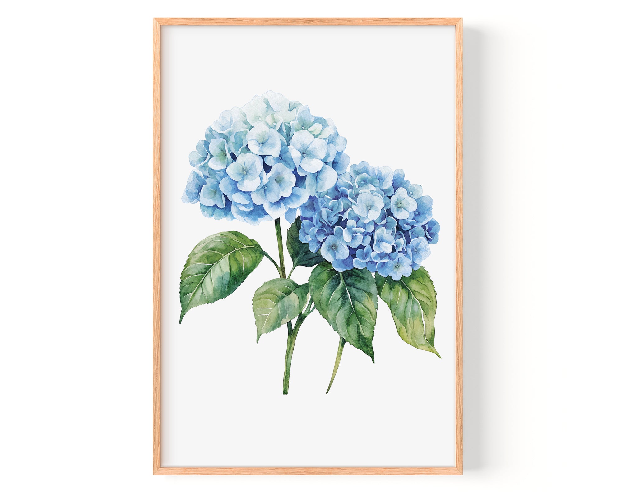 A framed watercolor painting depicting two blue hydrangea flowers with green leaves.