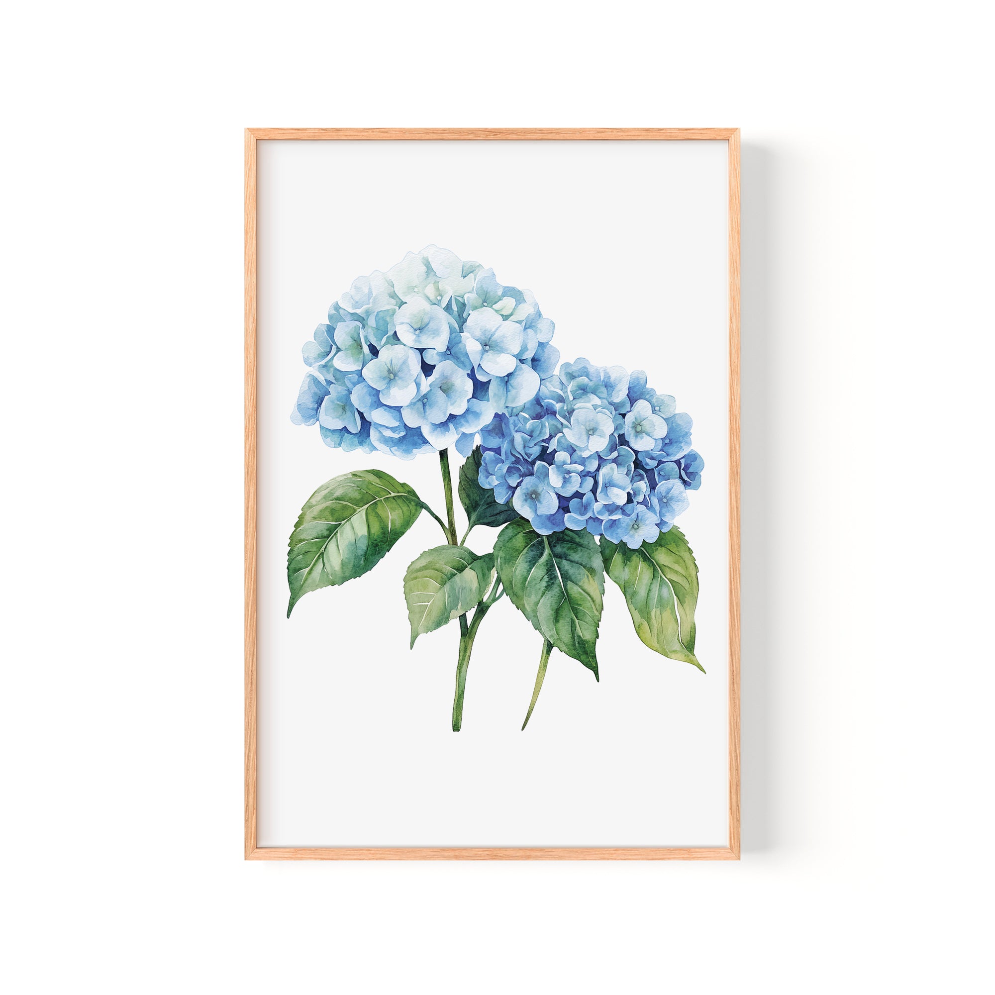 A framed watercolor painting depicting two blue hydrangea flowers with green leaves.