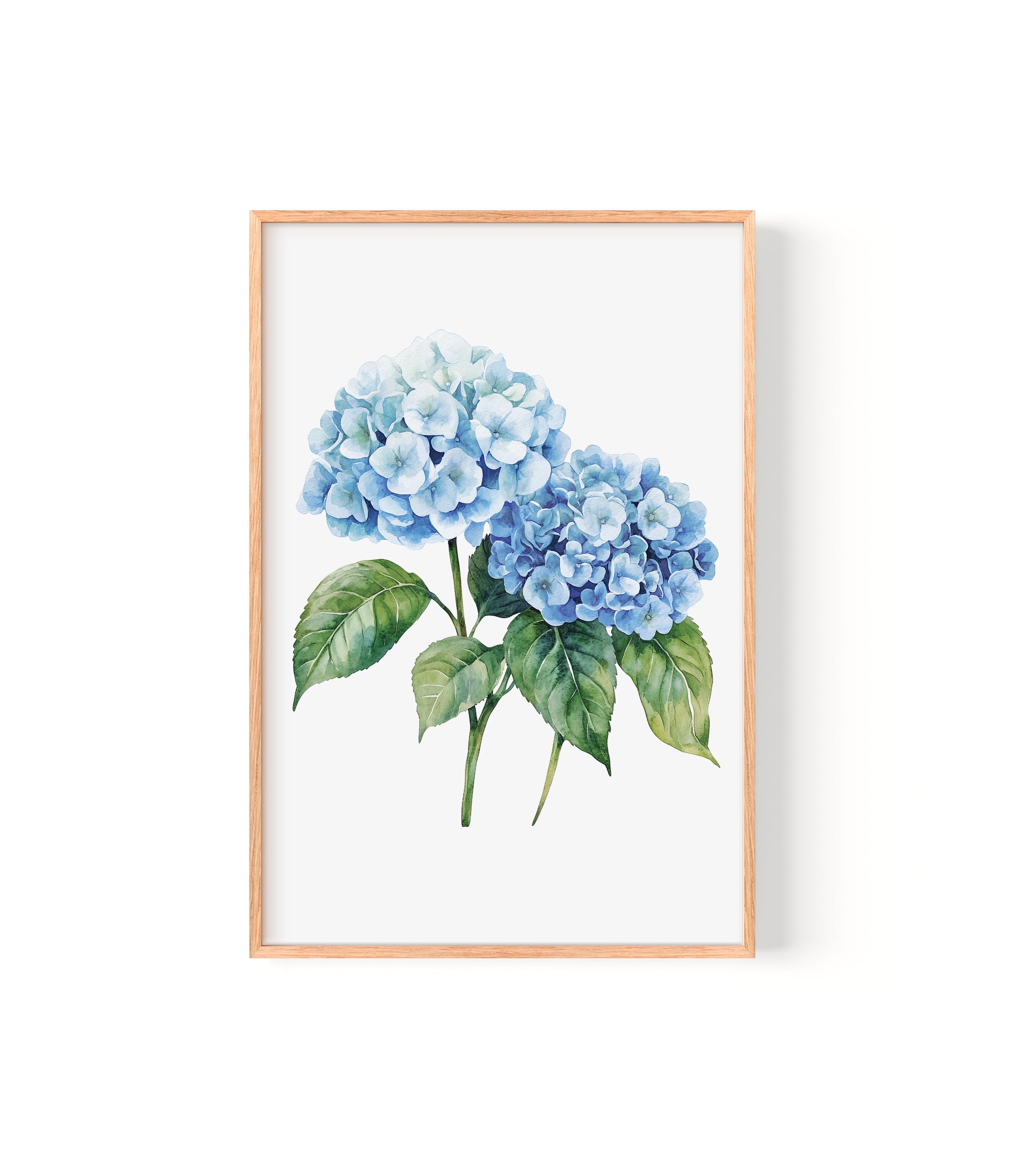 A framed watercolor painting depicting two blue hydrangea flowers with green leaves.