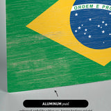 the flag of brazil painted on a piece of wood
