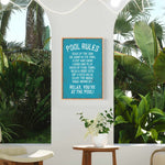 a picture of a pool rules poster hanging on a wall