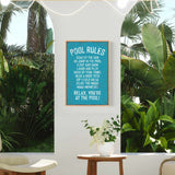 a picture of a pool rules poster hanging on a wall