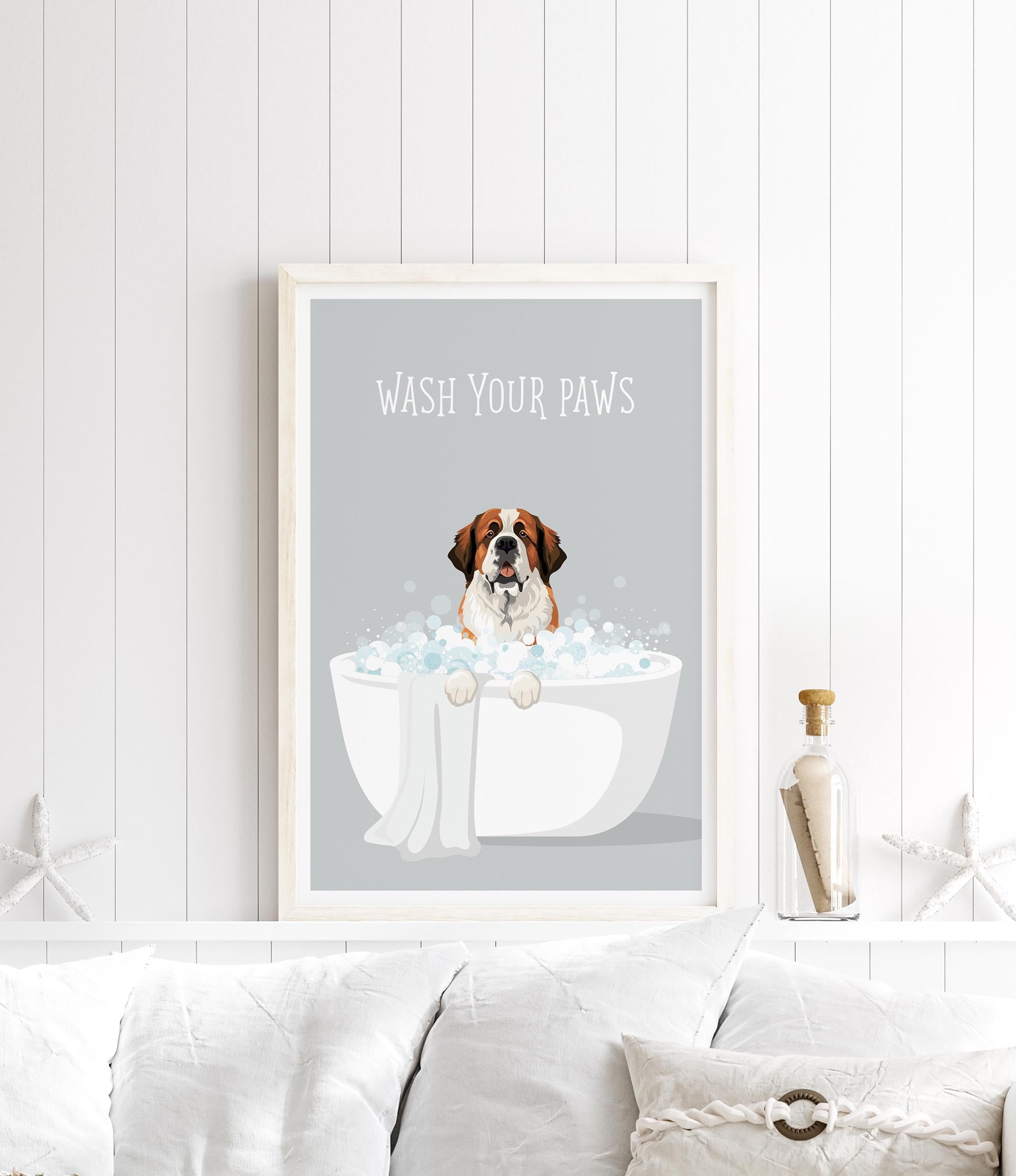 A framed poster with a cartoon image of a dog sitting in a bathtub filled with bubbles, accompanied by the text "WASH YOUR PAWS".
