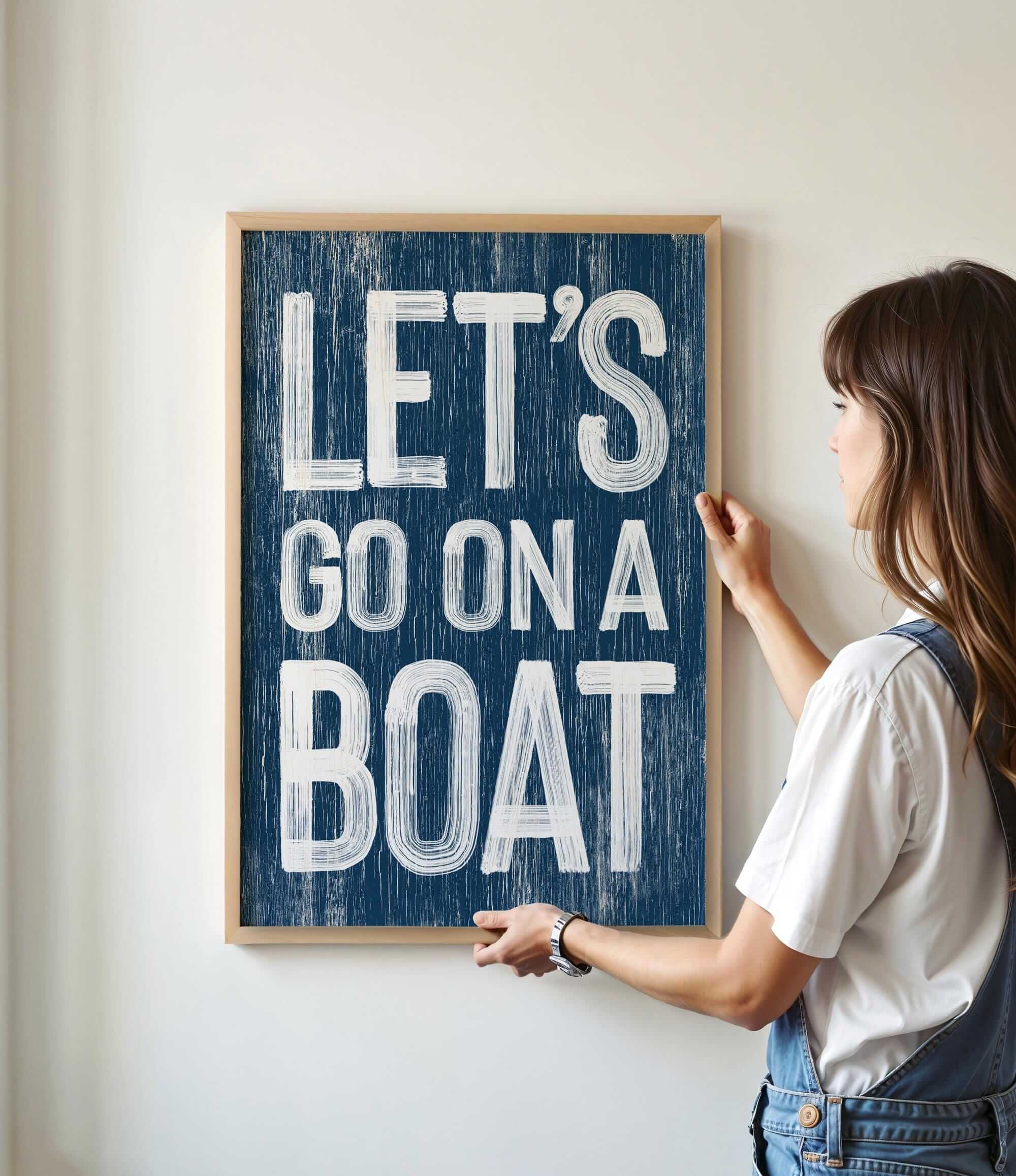 a woman holding a sign that says let&#39;s go on a boat