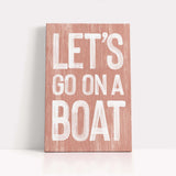 a wooden sign that says let&#39;s go on a boat