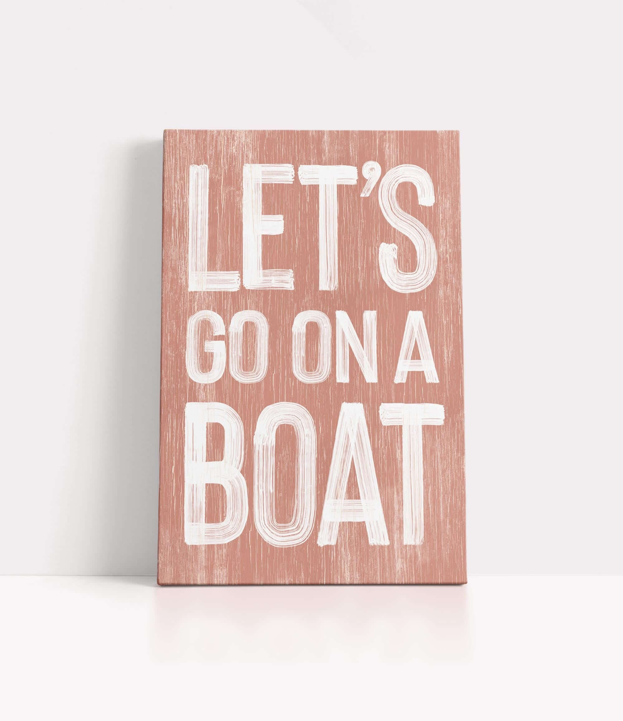 a wooden sign that says let&#39;s go on a boat