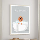 A framed poster with a dog sitting in a bathtub filled with bubbles, accompanied by the text "WASH YOUR PAWS".