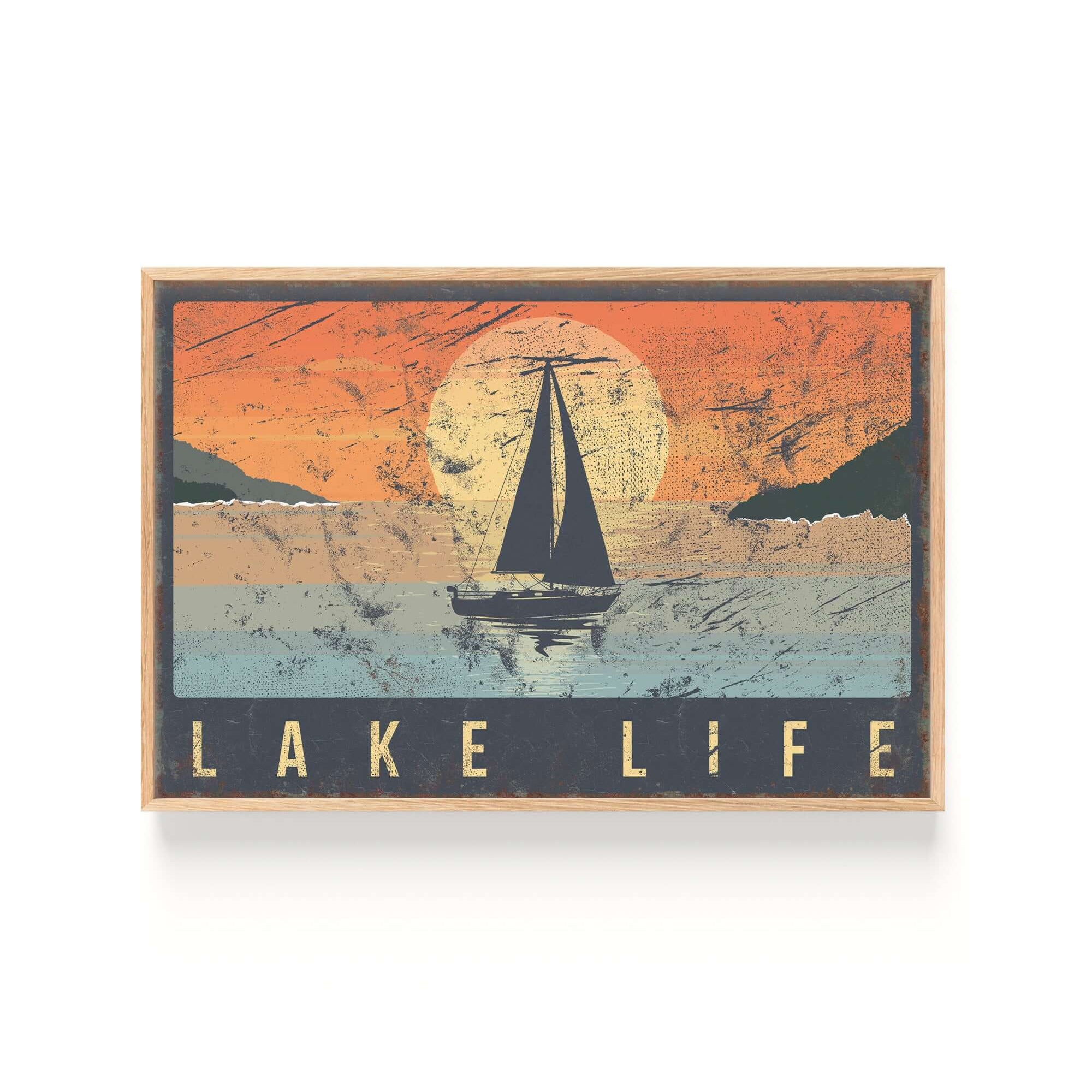 a picture of a sailboat on the water at sunset