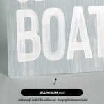 a wooden sign that says go on a boat