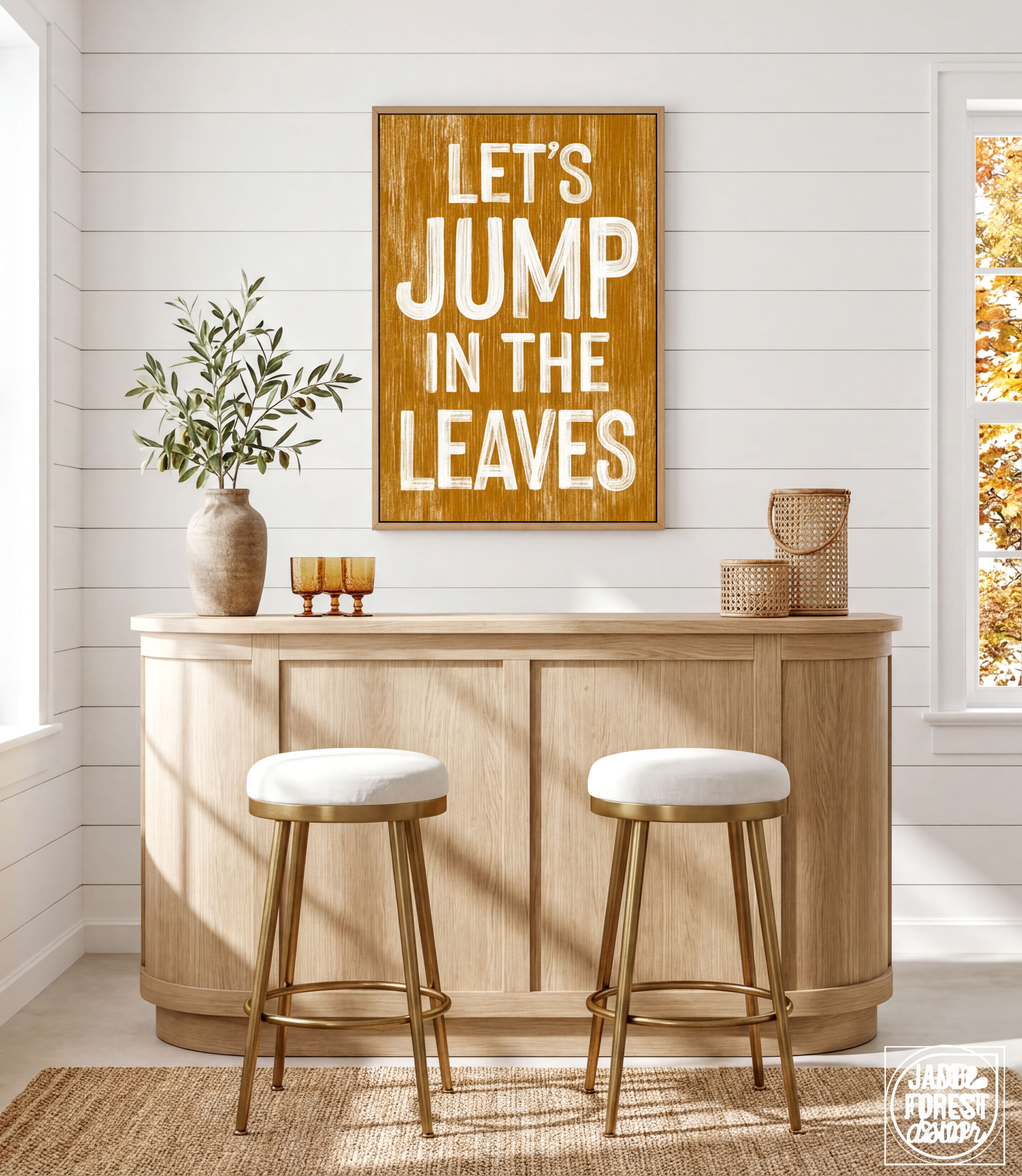 a cozy and inviting bar area with a wooden bar counter, two white stools, and a framed sign that reads "Let's JUMP in the LEAVES". The bar counter is adorned with a vase of greenery and a basket, adding a touch of nature to the space. The overall atmosphere of the image is warm and welcoming, inviting patrons to enjoy their time at the bar.