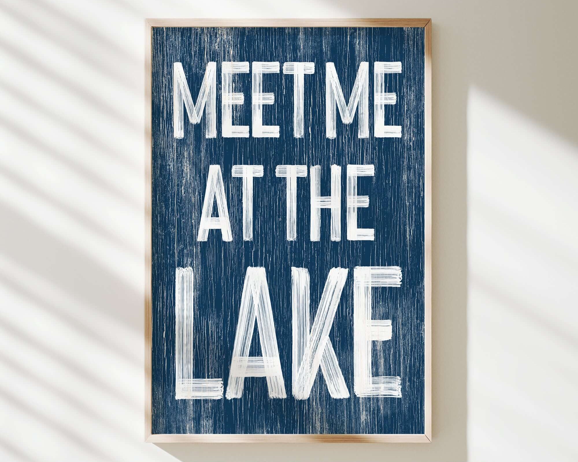 a sign that says meet me at the lake