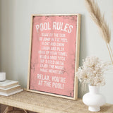 a picture of a pink poster on a shelf