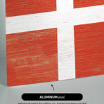 a piece of wood with a flag painted on it