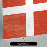 a piece of wood with a flag painted on it
