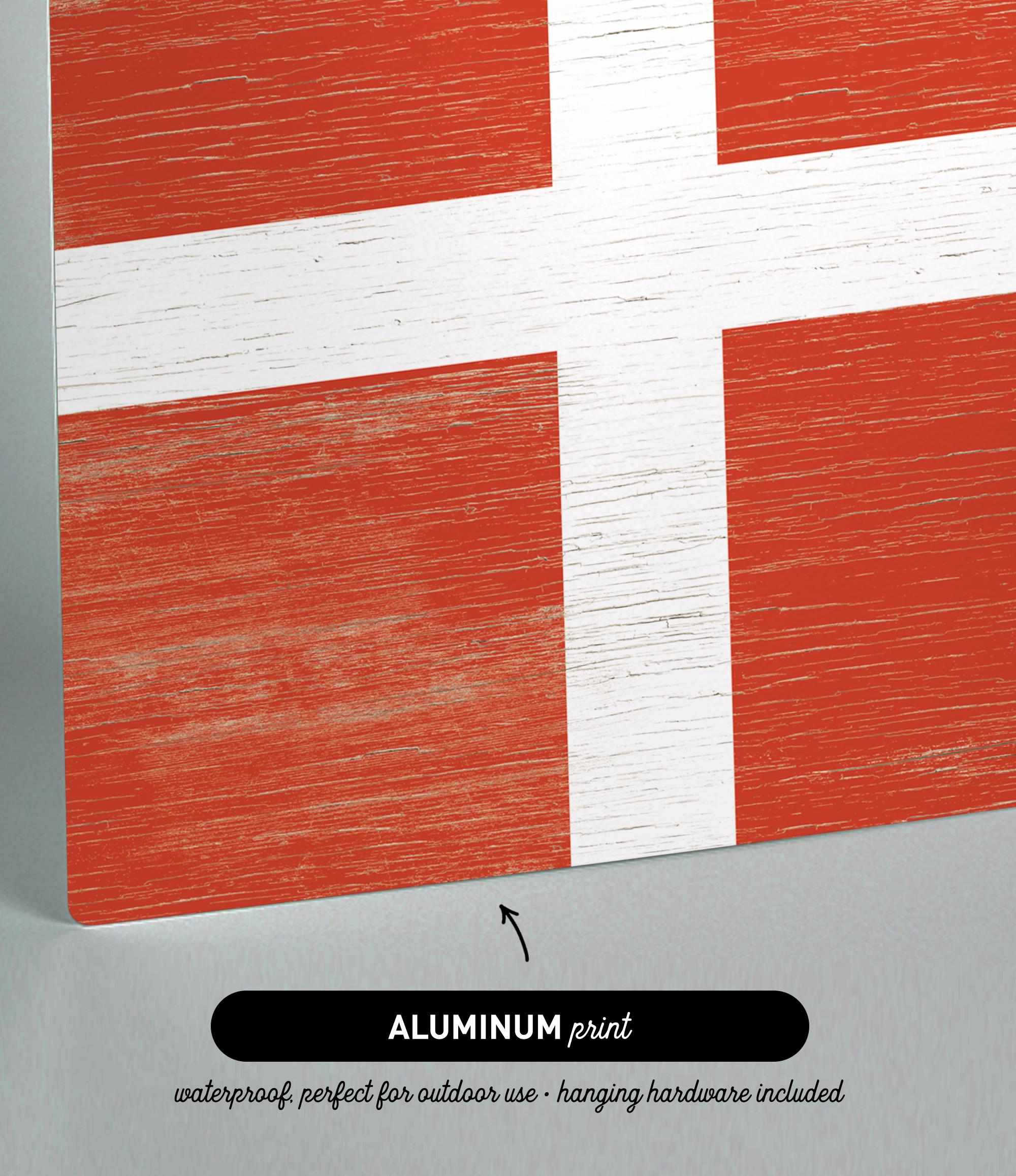 a piece of wood with a flag painted on it