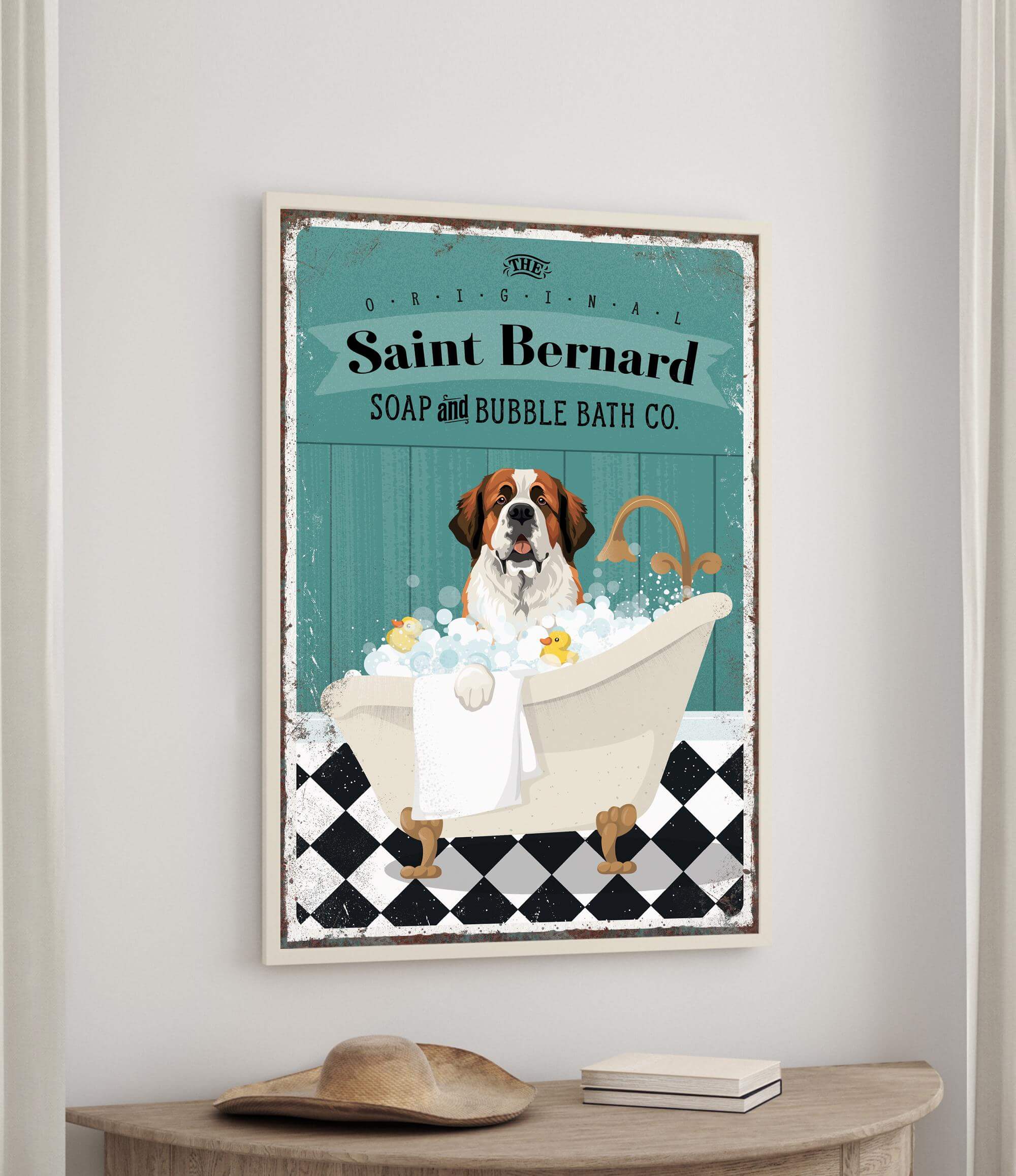 A framed poster of a Saint Bernard dog sitting in a bathtub, surrounded by bubbles, with the text "Saint Bernard SOAP and bubble bath co."
