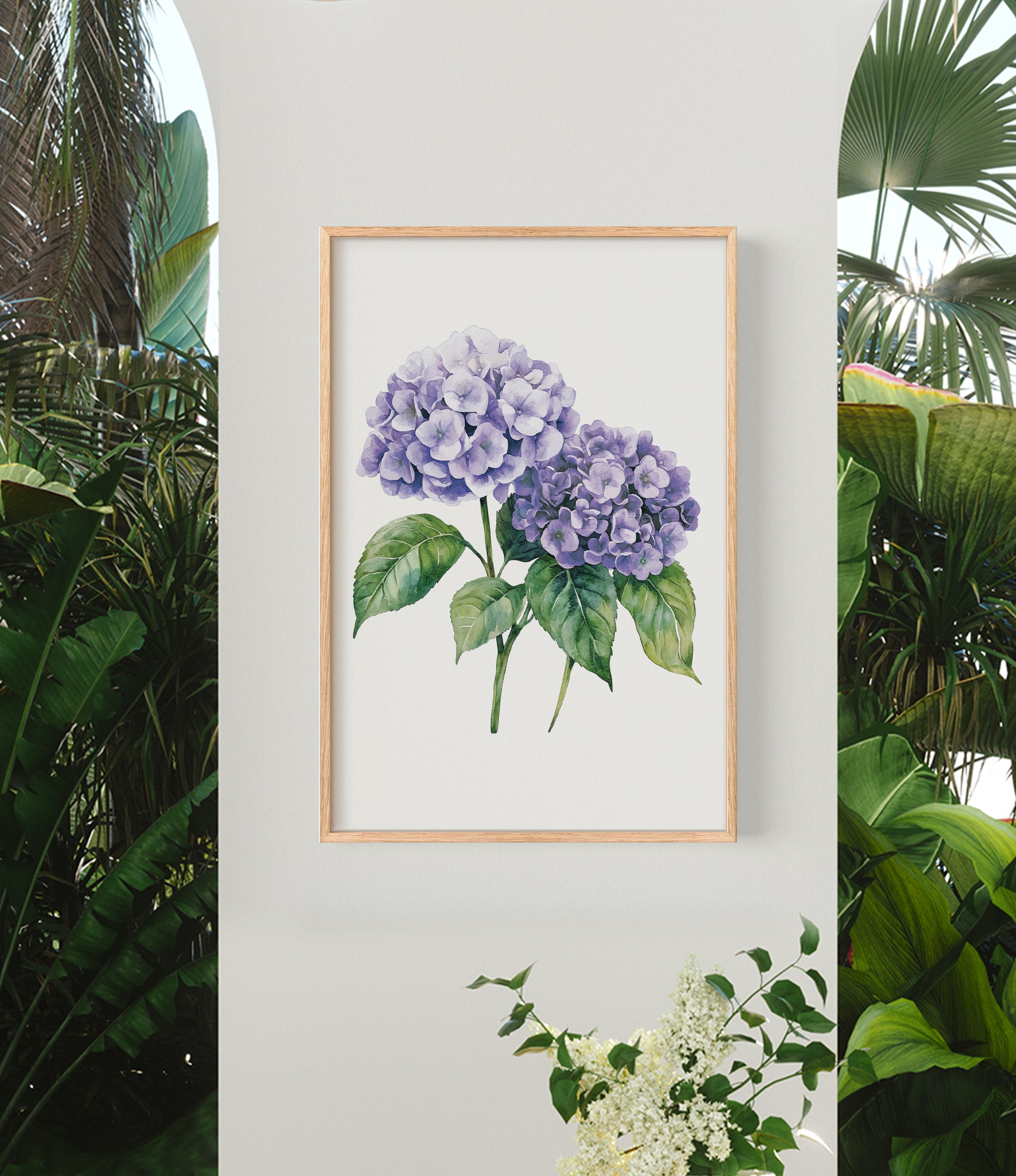 a framed watercolor painting of purple hydrangeas hanging on a wall, surrounded by lush greenery and tropical plants.