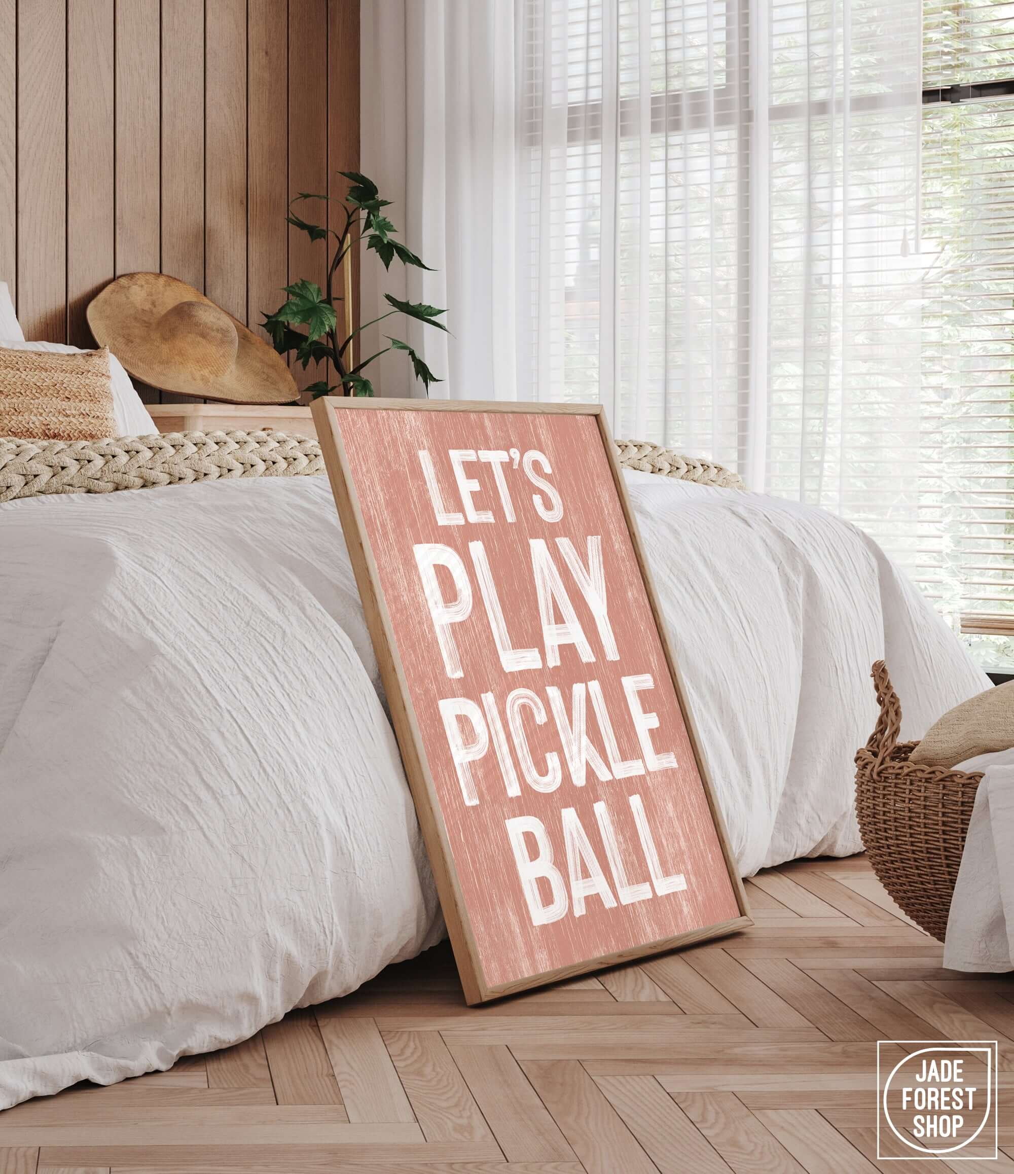 a wooden sign that says let's play pickle ball