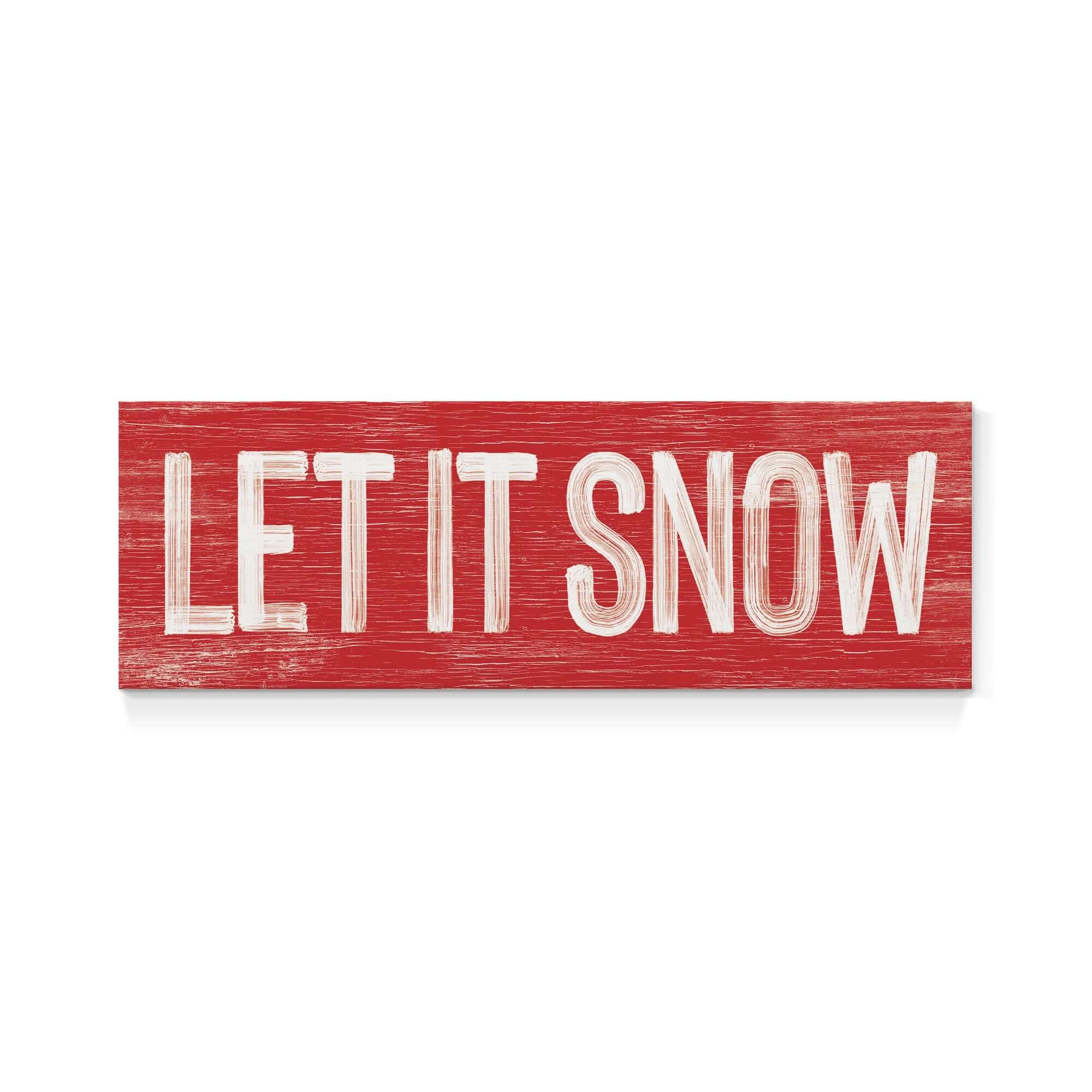 a wooden sign that says let it snow