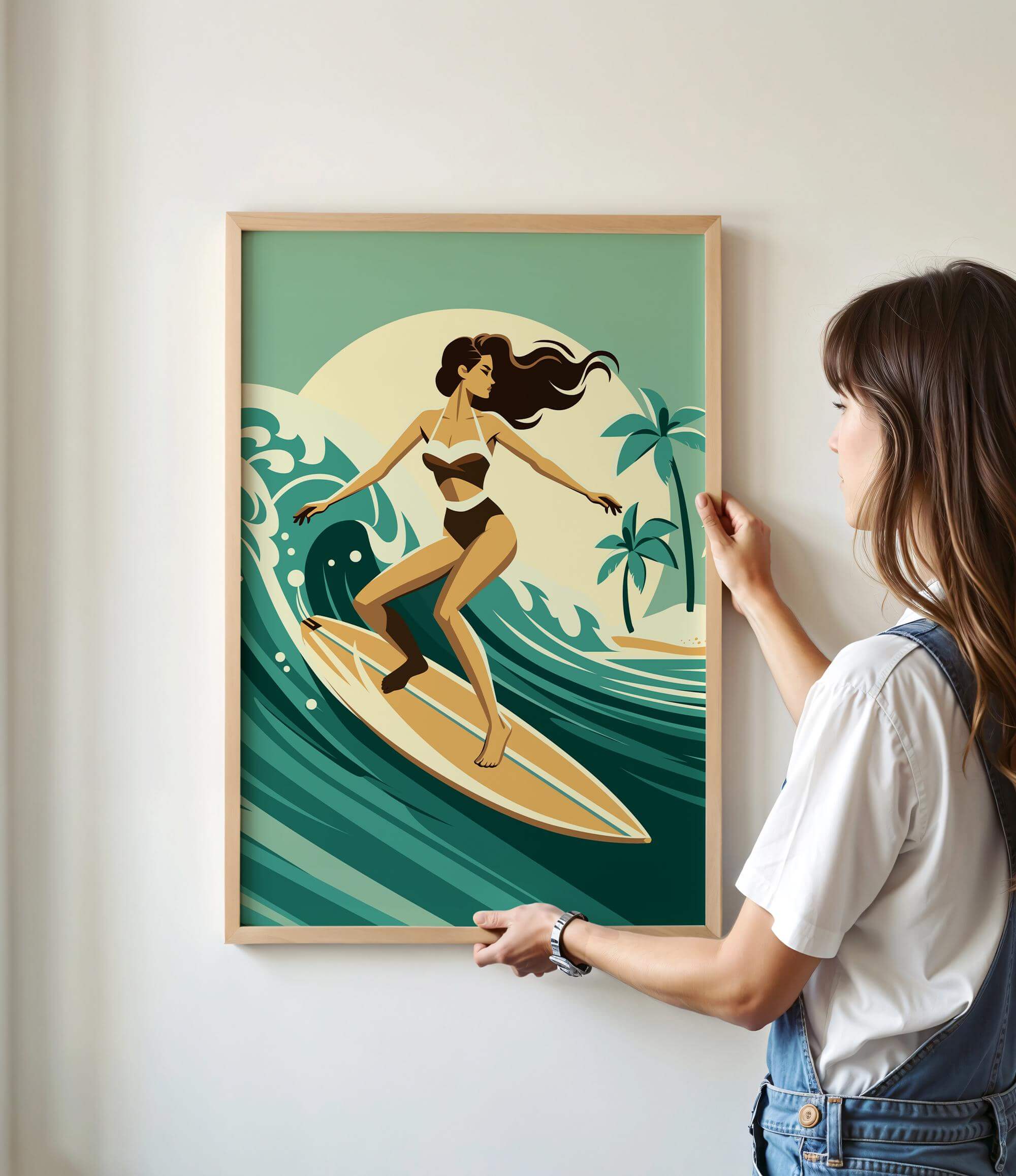 A woman is standing in front of a framed illustration of a woman surfing on a wave, wearing a bikini.
