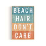 a wooden sign that says beach hair don't care