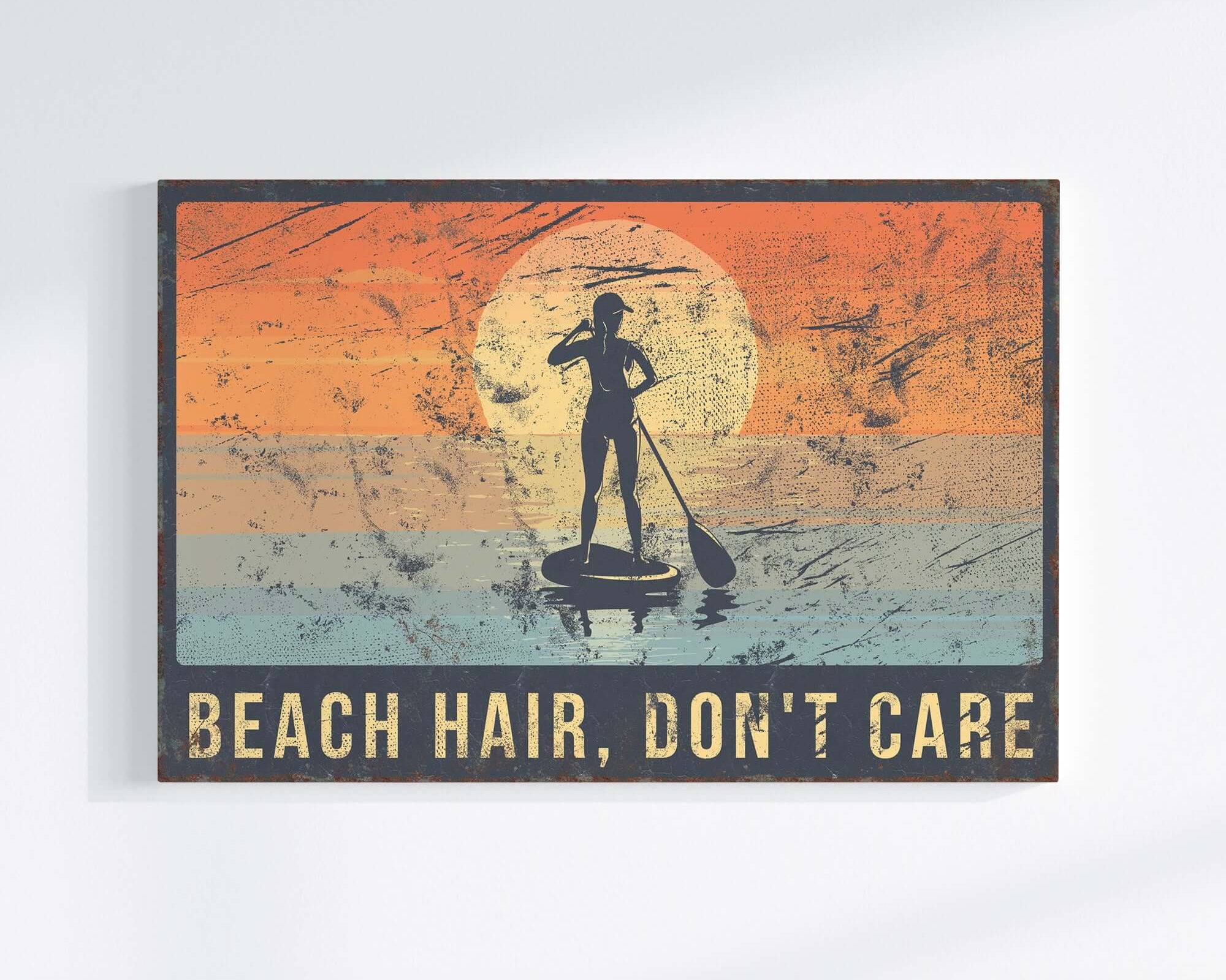 a picture of a man on a surfboard with a sunset in the background