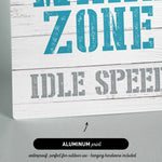 a sign that reads wake zone idle speed