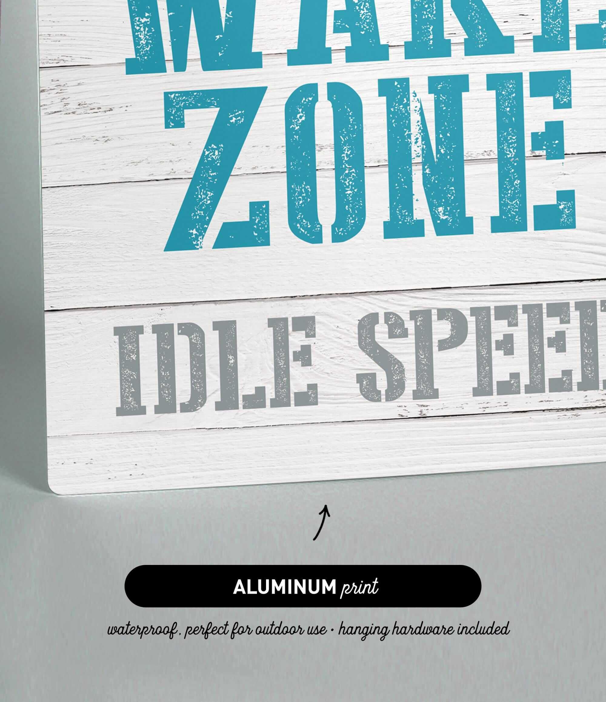 a sign that reads wake zone idle speed