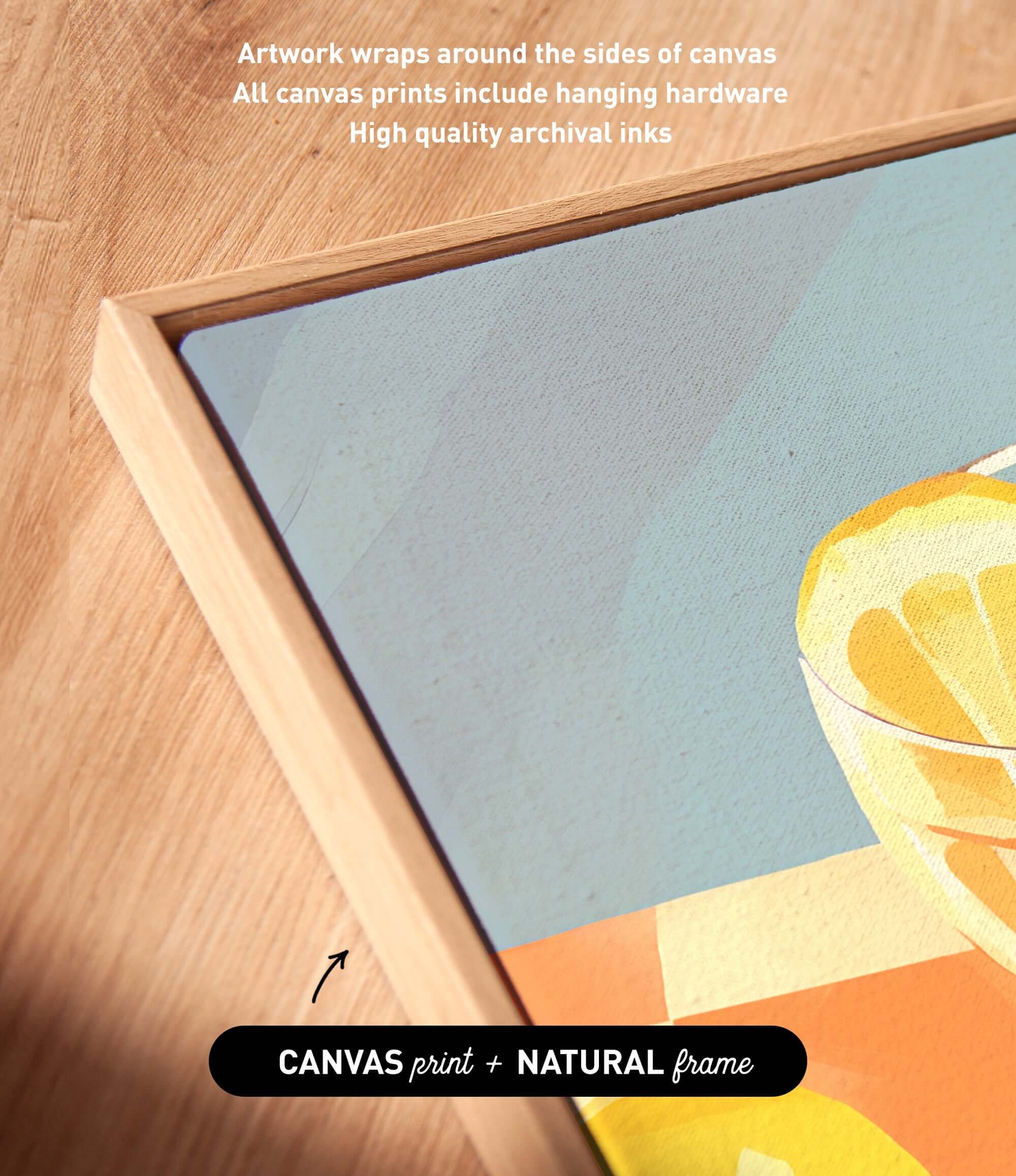 a wooden surface with a framed artwork depicting a vibrant abstract design. The artwork is wrapped around the sides of the canvas, and the canvas prints include hanging hardware. The artwork is described as having high quality archival inks.