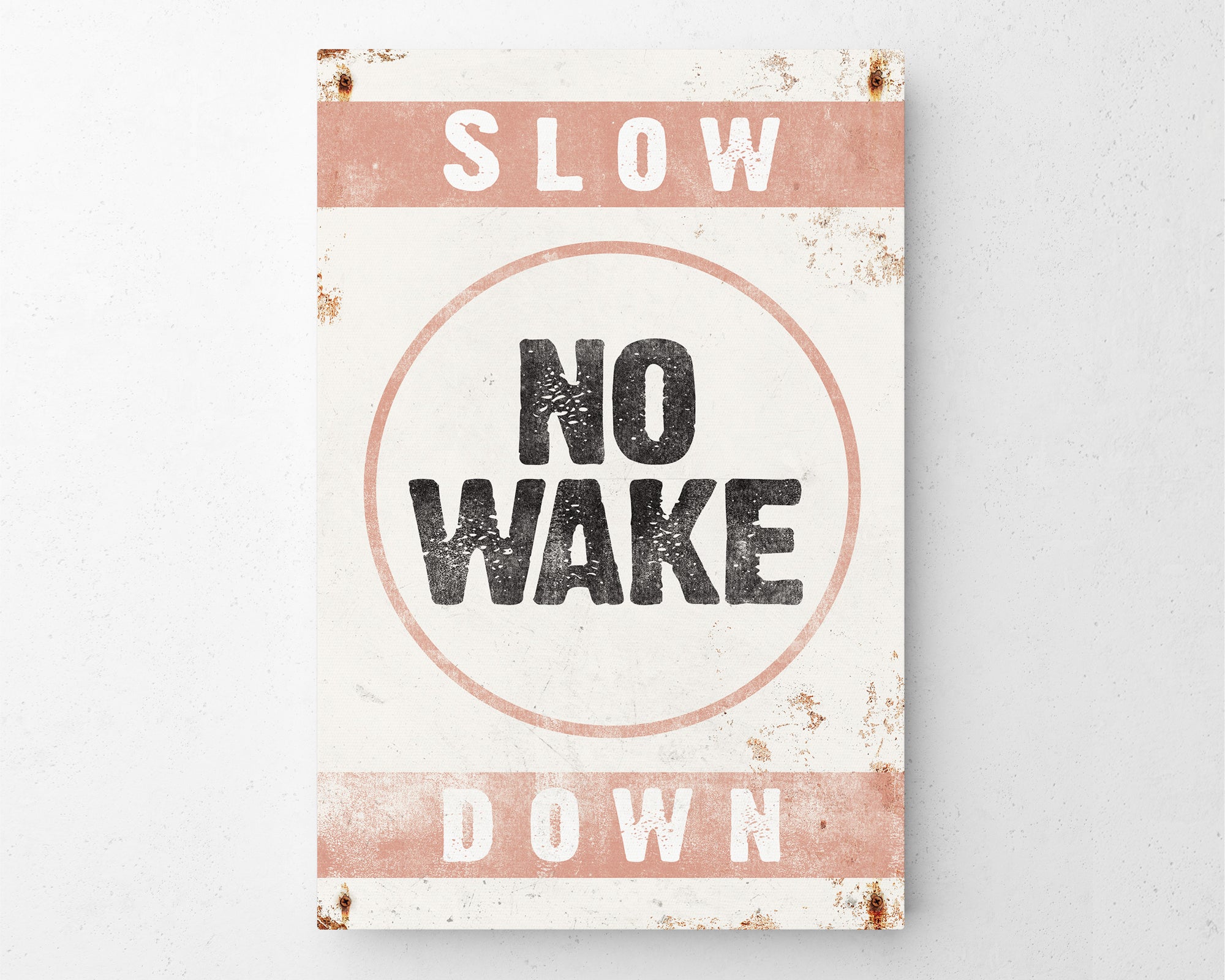 a sign that says slow no wake down