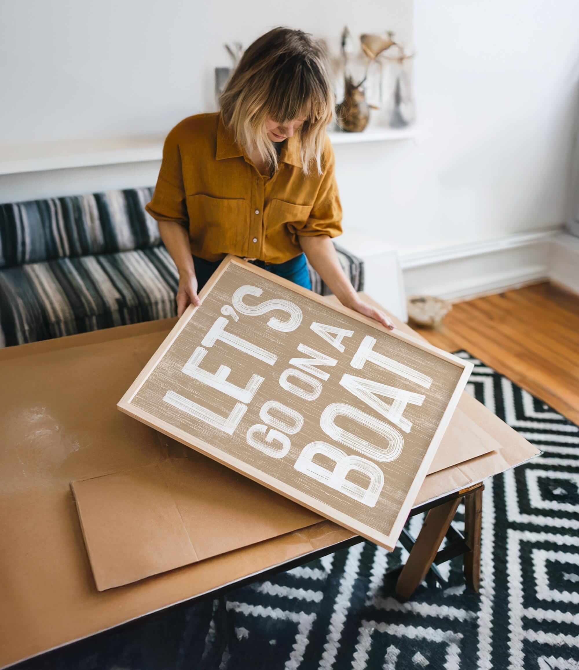 a woman holding a cardboard sign that says let&#39;s do what you want