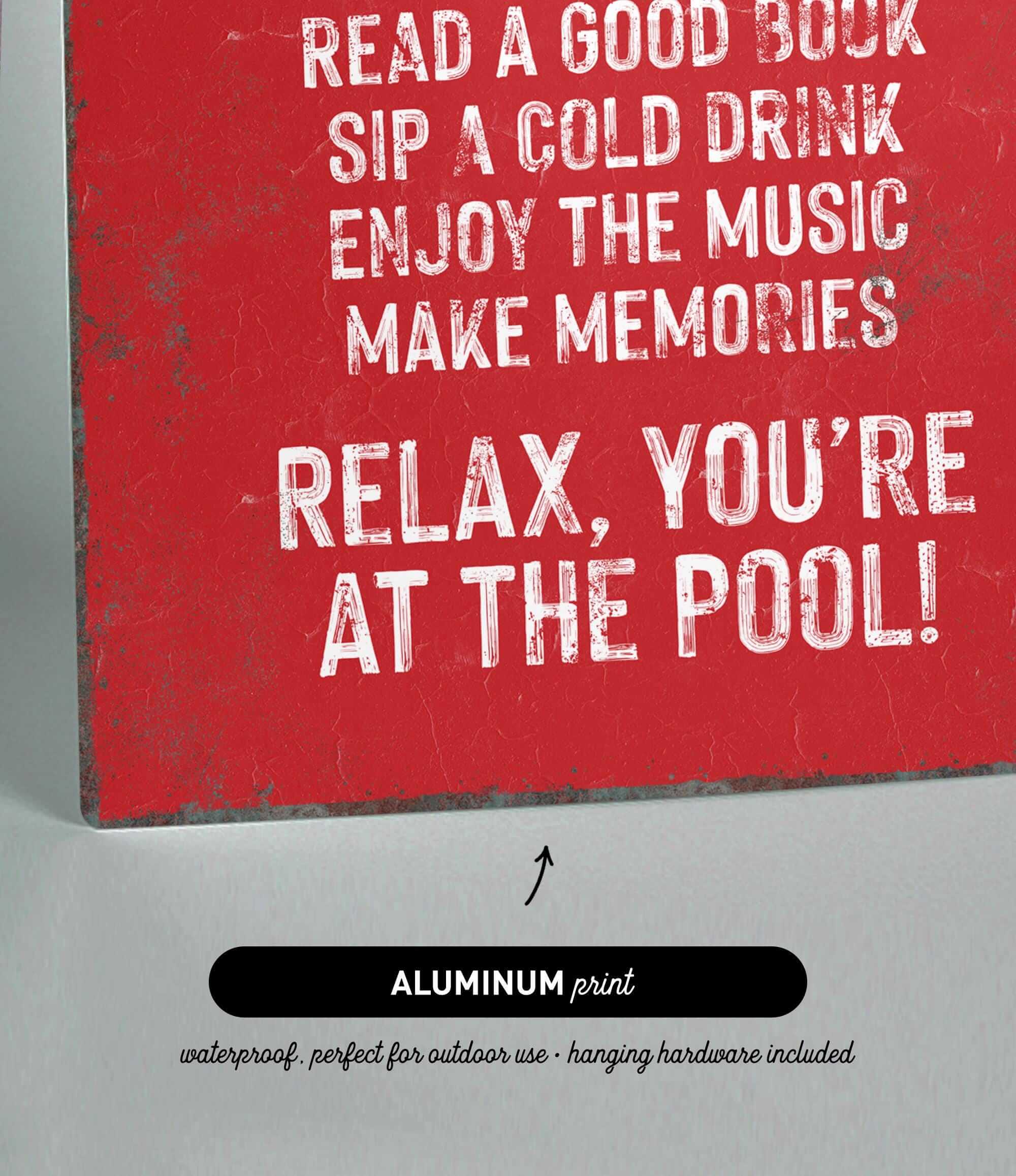 a picture of a red sign that says relax you&#39;re at the pool