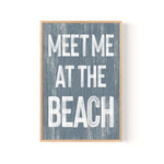 a sign that says meet me at the beach