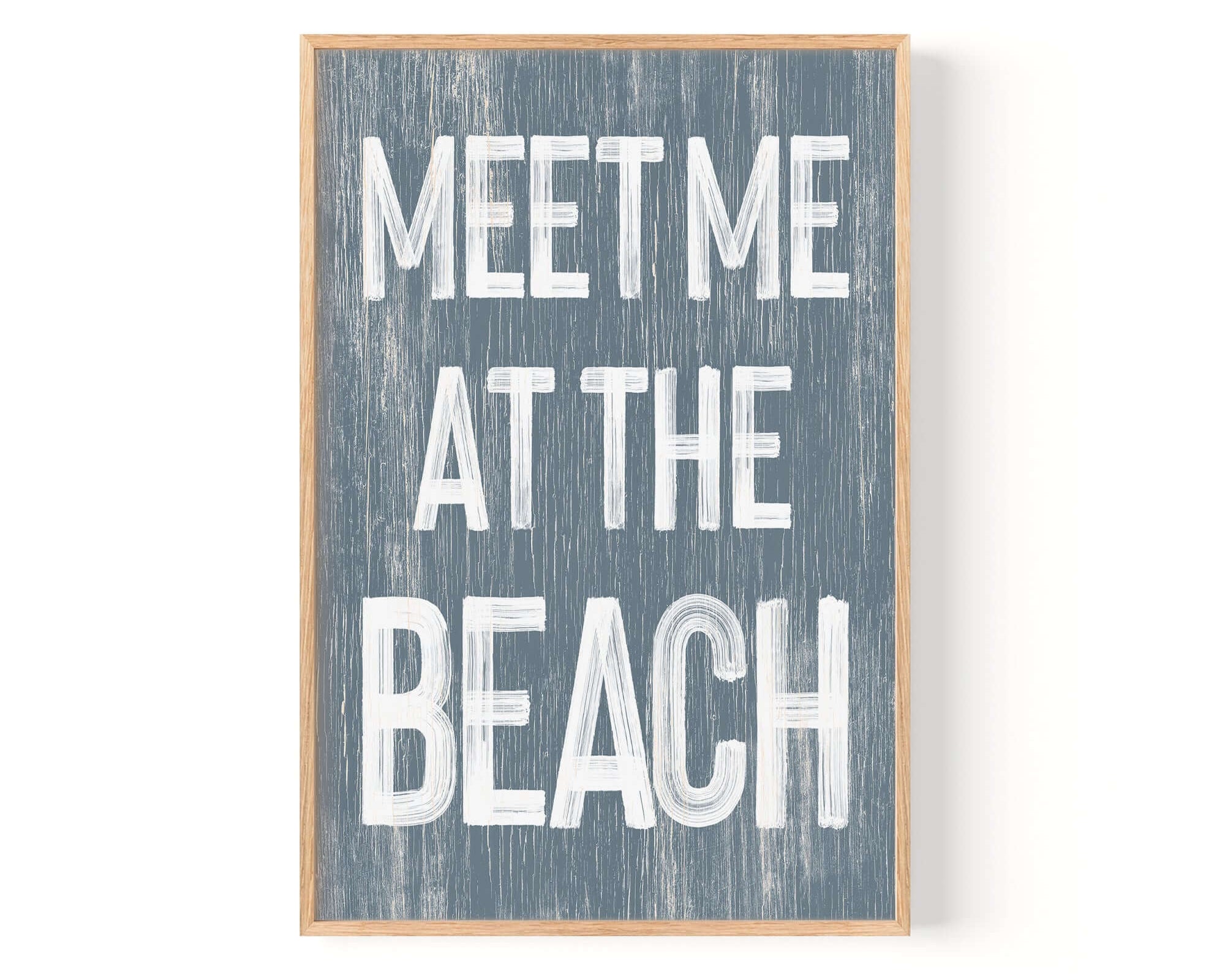 a sign that says meet me at the beach
