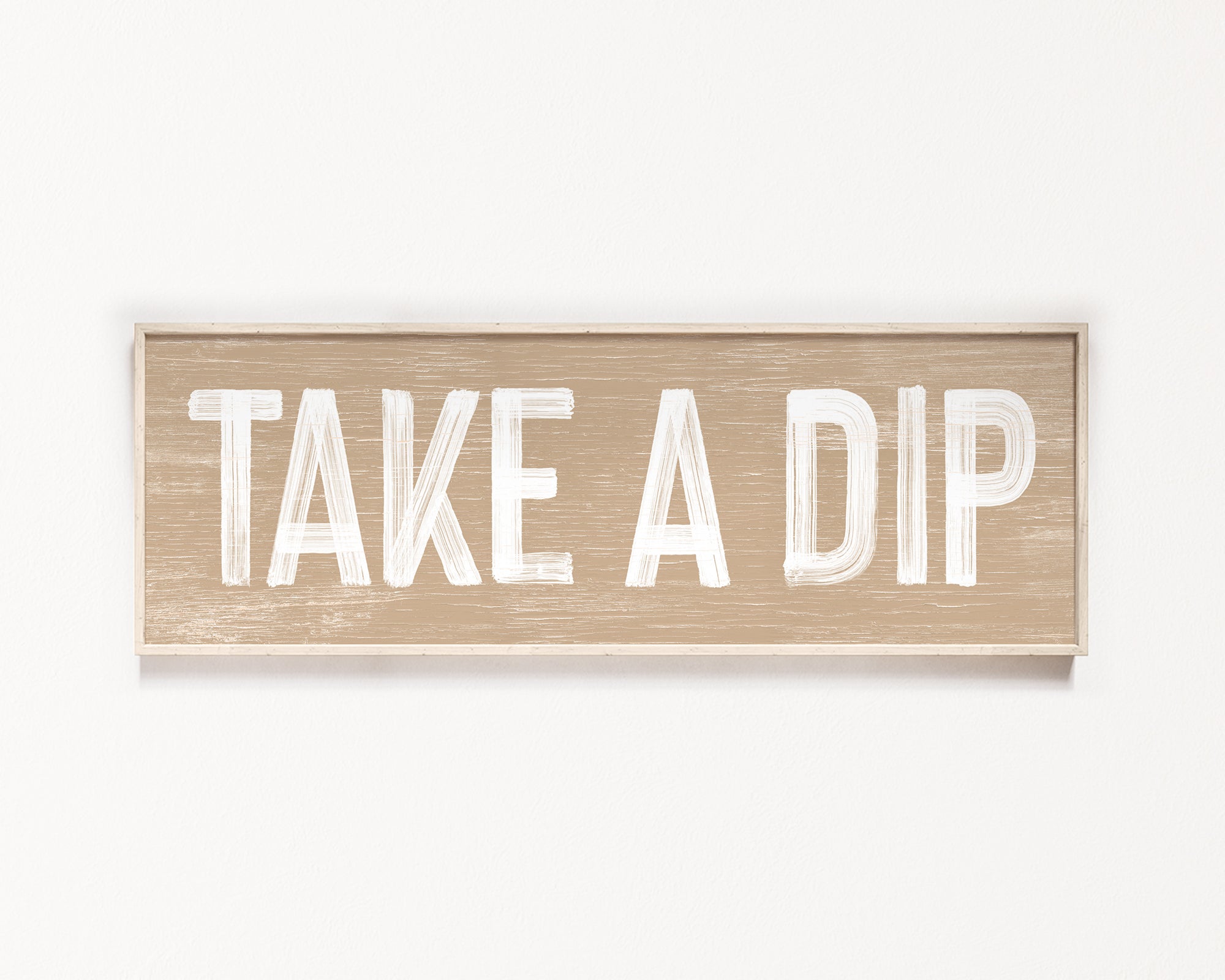 a wooden sign that says take a dip