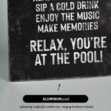 a black and white picture of a sign that says relax you&#39;re at the